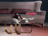 Ground coffee table with shaped tabletop, ideal for positioning in front of a sofa