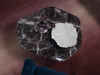 View from above of the Levanto Red marble table top in an irregular hexagonal shape