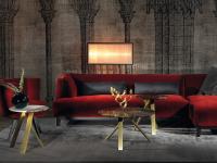 A composition of multiple Meridian coffee tables with the Greg sofa and the Diva armchair by Borzalino