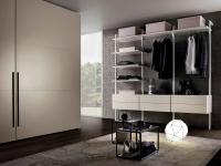 Linear wall composition with shelves and drawers, combined with Deneb Lounge wardrobe
