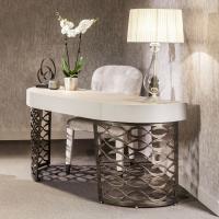 Isidoro vanity table is upholstered on all sides so can be placed in the centre of a room