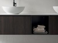 The open compartment is useful for creating interesting variety between open and closed sections of your bathroom furniture