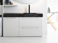 Oasis washbasin cabinet for a laundry room - made up of a laundry base with 2 drawers and a lateral base with a deep drawer.