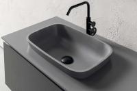 Close up of the built-in countertop Faber 50 washbasin in Corian deep cloud 