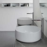 Side view of the round Cognac 42 washbasin in glossy white ceramic