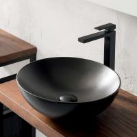 The round Firenze washbasin in matt-black ceramic