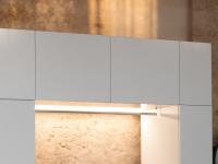 Oasis suspended wall cabinets, used to create a bridge-style laundry unit