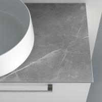 Close up of the washbasin cabinet with additional top in a stone finish (23 Amani)