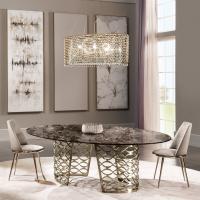 Gioia pendant lamp is perfect over a classic design marble table