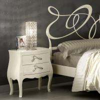 Gioia can be placed on a classic nightstand beside a wrought iron bed