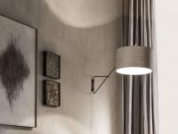 Lia vintage wrought iron lamp by Cantori in the wall sconce model, with adjustable lampshade.  
