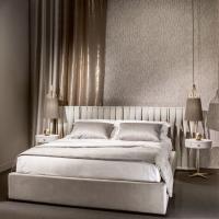 Pair of Sofia pendant lamps on both sides of a classy bed