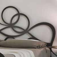 Detail of the headboard's asymmetric curved design