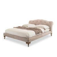 George classic bed with low tufted headboard and carved metal feet by Cantori