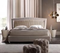 Luxury upholstered bed Portofino by Cantori with pleated heaboard central panel
