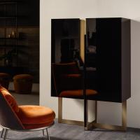 Mirage cupboard with two hinged doors and modern cross base in metal by Cantori
