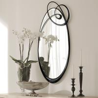 Ghirigori mirror with swirl metal frame