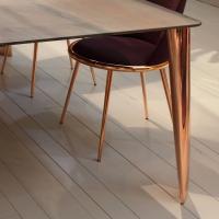 Milos design table with copper legs and marble top by Cantori.