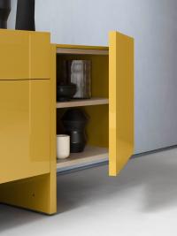 Side doors with central shelf, available on all sideboard models regardless the sizes and configuration of the storage units