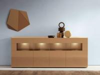 Sideboard in hide-leather glossy lacquer with central big open compartment. Single light for each compartment.