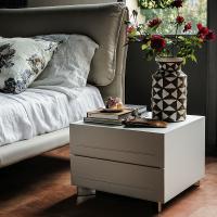 Dyno bedside table with leather-covered fronts