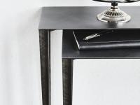 Detail of the height difference between the two console tables, the side room allows to comfortably put any object