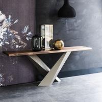 Stratos is a console table in wood with irregular borders by Cattelan with legs in titanium embossed metal