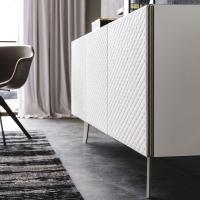 Detail of the white lacquered structure with titanium-embossed metal frame of the Absolut sideboard by Cattelan