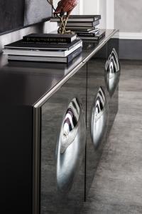 Detail of the rounded doors of the sideboard Paramount by Cattelan