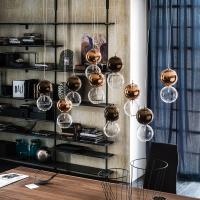 Composition of 10 Apollo pendant lamps, in various finishes
