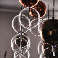 Close-up of the borosilicate glass balls on the Apollo lamp by Cattelan