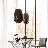 Asia by Cattelan has a refined porcelain lampshade decorated with glossy varnishes and precious glamour metals