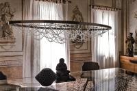 Cristal chandelier with glass beads by Cattelan furnishes classic interiors