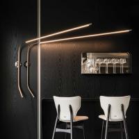Fisherman wall arch shaped adjustable led lamp by Cattelan. Long lightning surface in embossed metal