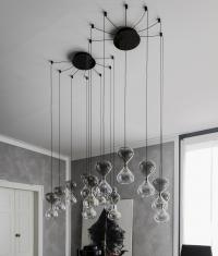 Sablier pendant lamps by Cattelan with round black chrome canopies
