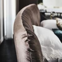 Close-up of the fabric headboard on the Marlon bed by Cattelan
