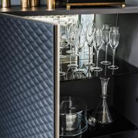 Inside of the cupboard Tiffany by Cattelan with 2 smoked glass shelves and mirrored backrest matching the upper compartment.