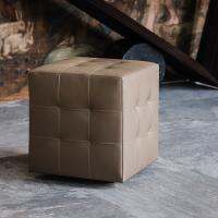 Bob tufted leather ottoman with casters by Cattelan