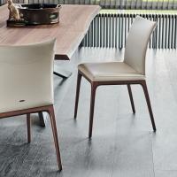 Arcadia chair by Cattelan with wooden legs and leather upholstery