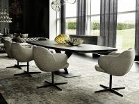 Bombè X chair by Cattelan matched to the Stratos tables: the 4 spokes base is matched to the Stratos table structure
