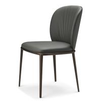 View from the side of the Chris ML by Cattelan upholstered chair with metallic legs