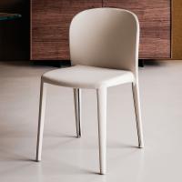 Daisy chair characterized by an extra soft seat by Cattelan