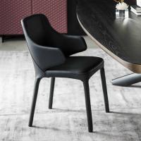 Wanda is an upholstered chair with embracing arms by Cattelan 