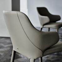 Detail of the wraparound backrest of the  armchair Wanda by Cattelan