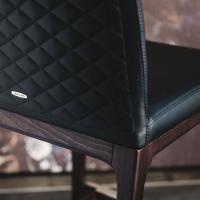 Detail of the quilted backrest of the Arcadia stool by Cattelan