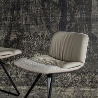 Axel is a stool with high comfort that is upholstered and covered with fabric, leather or faux leather