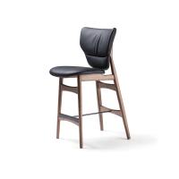 The upholstery characterising Dumbo stool is unique and really comfortable thanks to the thick backrest support and the curved shaped back and seat