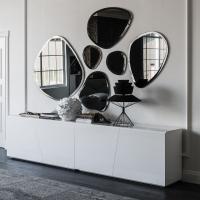Hawaii mirrors in various shapes and sizes, blending in with Explorer sideboard by Cattelan 