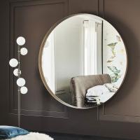 Wish round mirror by Cattelan in brushed bronze painted metal