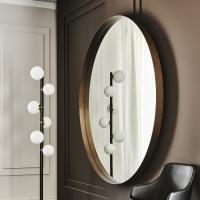 Wish round mirror by Cattelan in brushed bronze painted metal